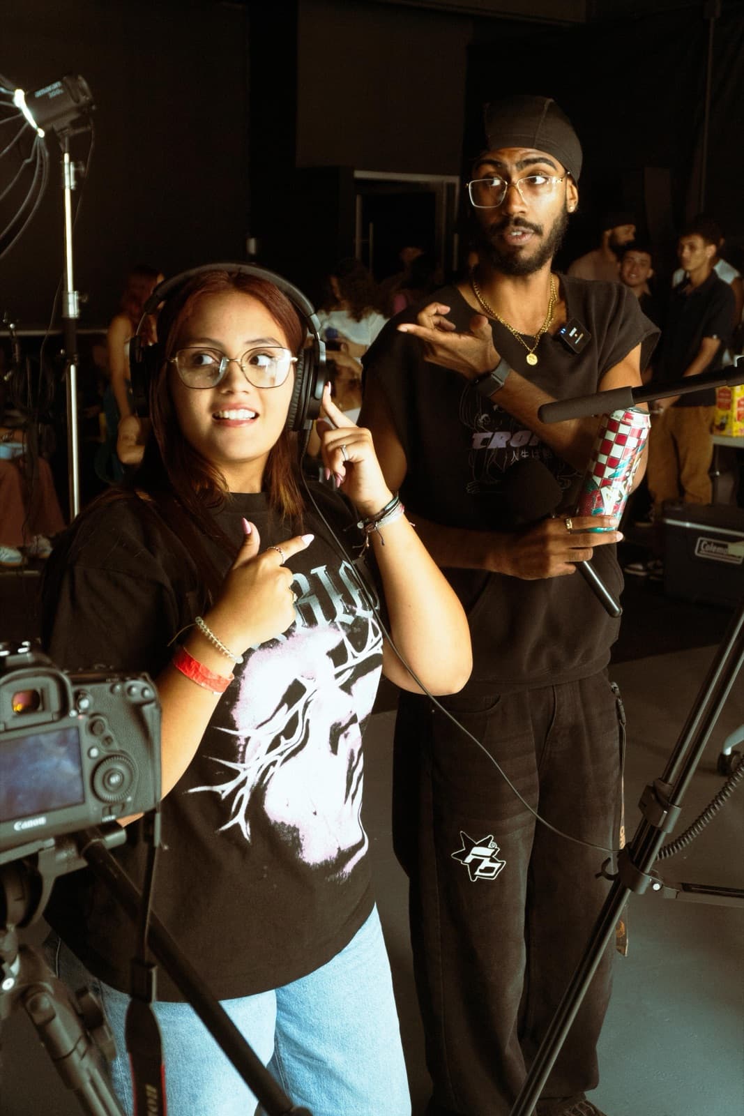Salomé throwing a peace sign behind the scenes of a shoot